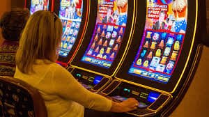 Colorful fruit machine interface inside bd bajer with teal glass layout